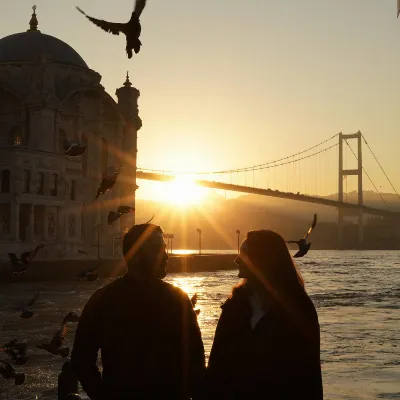 Golden Sunset Silhouette of Couple by Bosphorus Bridge & Seagulls