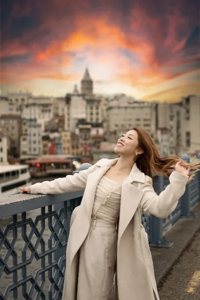 Joyful Woman Portrait on Galata Bridge at Sunset in Istanbul