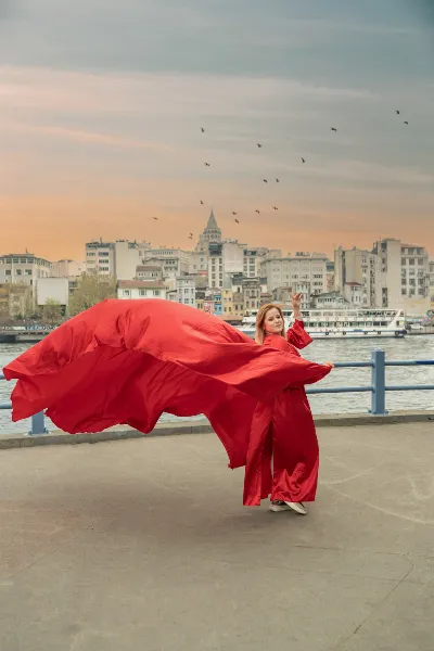 Red Flying Dress Soaring at Ortakoy Mosque & Bosphorus Waterfront