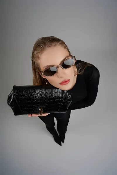 Avant-Garde Studio Model Portrait with Sunglasses & Croc Clutch